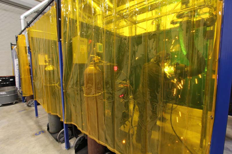 Student Welding in Workstation,