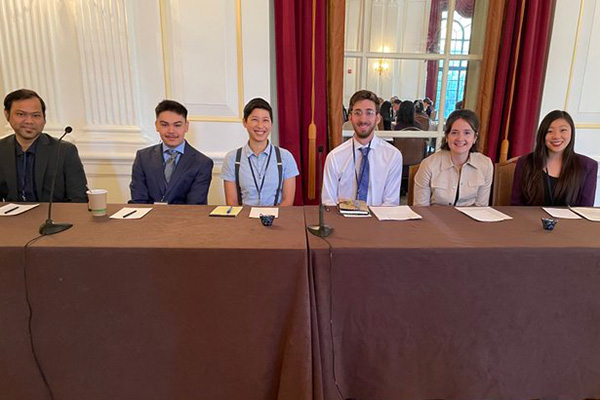 Reporting fellows on the Global Health panel prepare to speak at Washington Weekend 2022