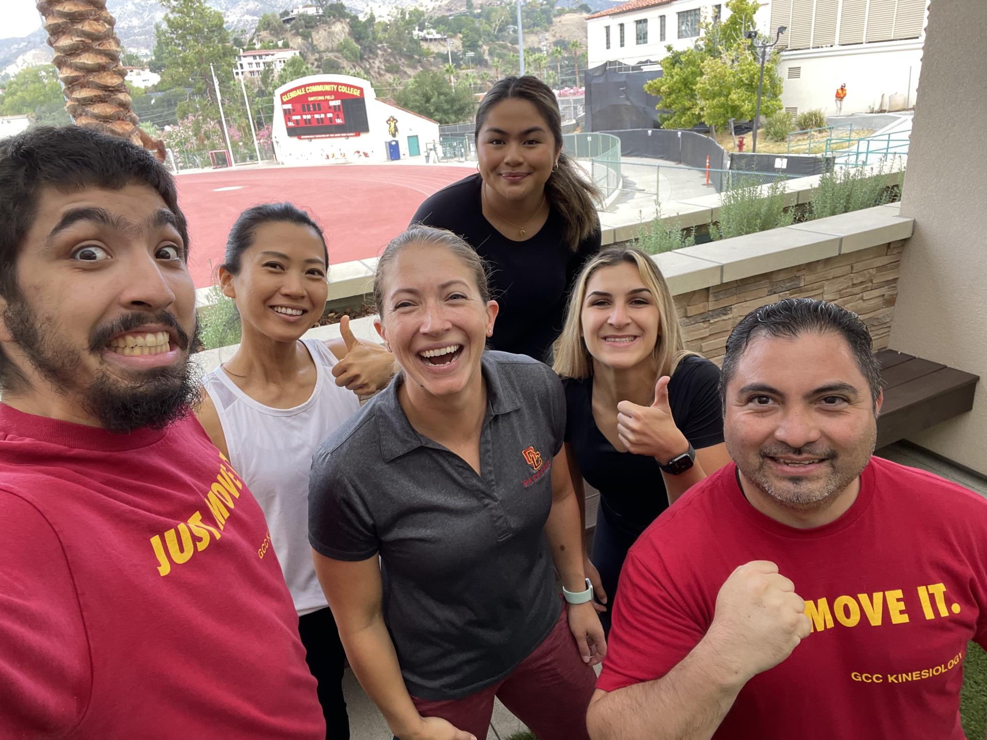 A group picture of smiling fitness professionals.